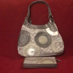 Coach Handbag and match with Wallet. Never use